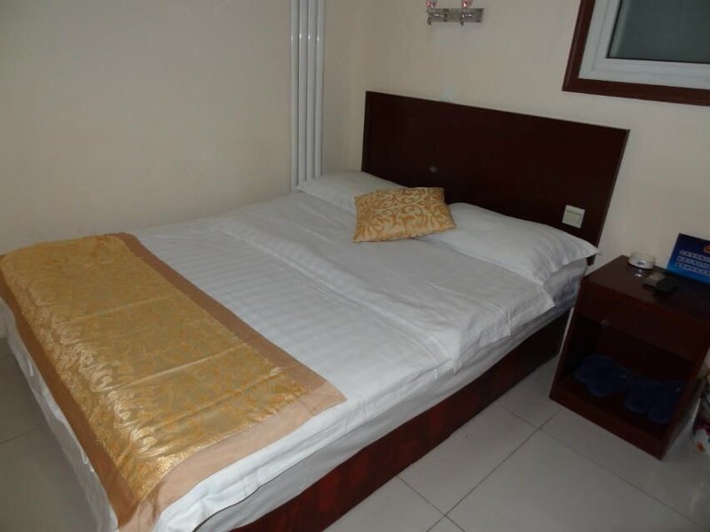 beijingyuanpengyijiabinguan Guest Room