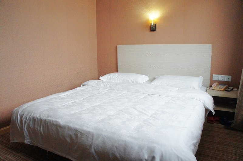 Wanzhong Caifu Chain Hotel Guest Room