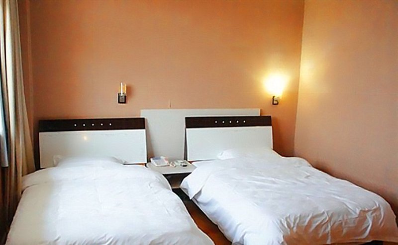 Wanzhong Caifu Chain Hotel Guest Room