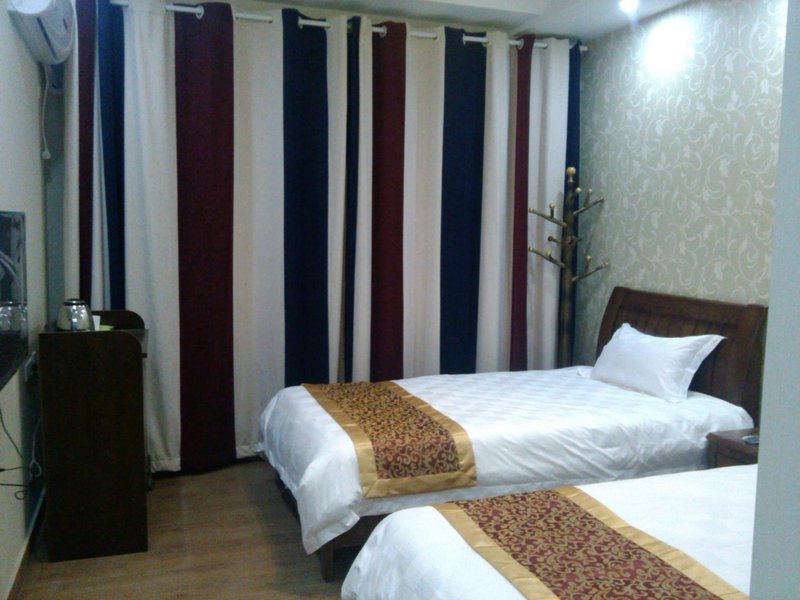 Bamboo City Holiday Hotel Guest Room