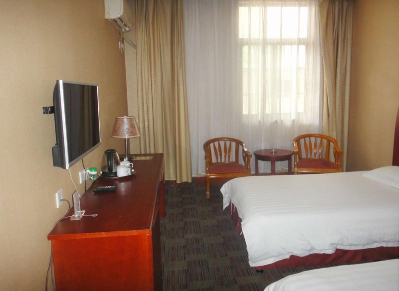 Huaqiao Business Hotel Guest Room