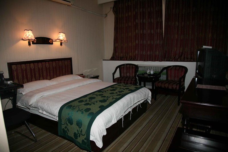 New Century Hotel Guest Room