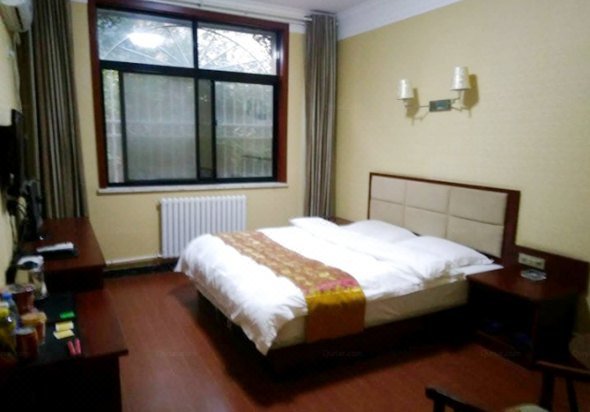 Xinbo Business Hostel Guest Room