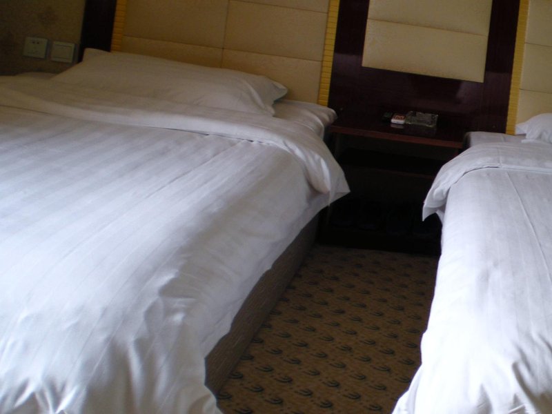 Yulin Hua Tai Business Inn Guest Room