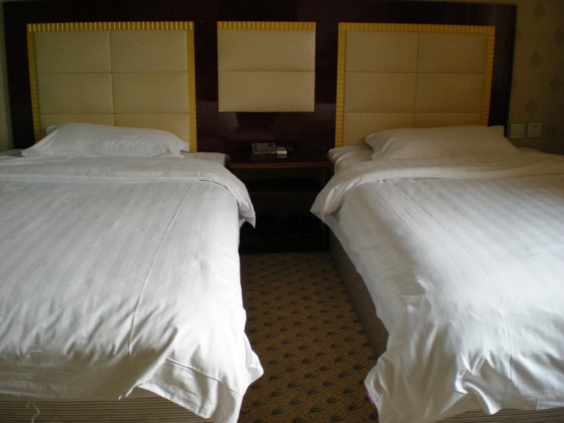 Yulin Hua Tai Business Inn Guest Room