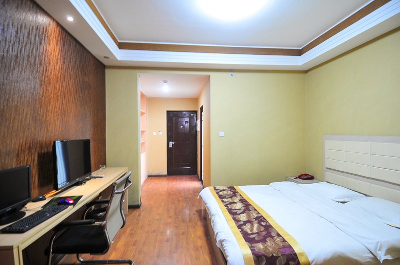 Xishuangbanna Baolong Business Hotel Guest Room