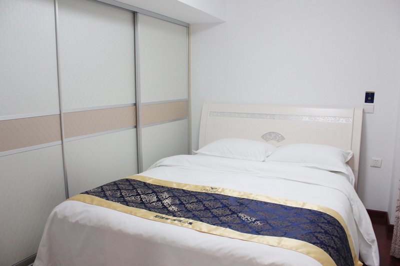 Sweetome Vacation Rentals (Wanghai Mingju)Guest Room