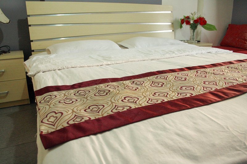 Qian Shou Apartment HotelGuest Room