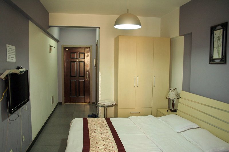 Qian Shou Apartment HotelGuest Room