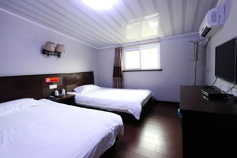 Taohuadao Donghaiwan Hotel Guest Room