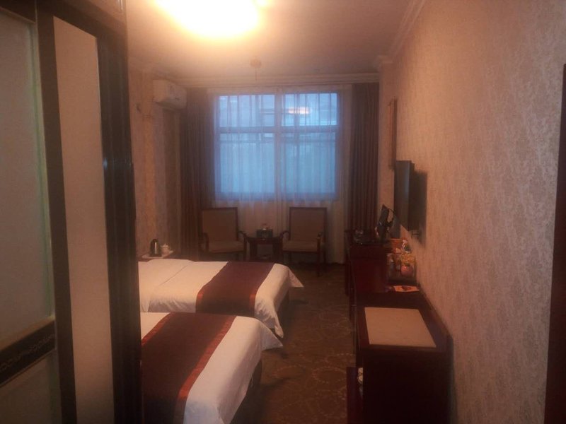 Xiangyuan Jinlong Business Hotel 客房
