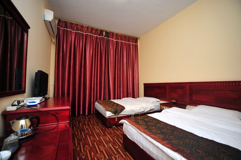 Xishuangbanna Mingju Business Hotel Guest Room