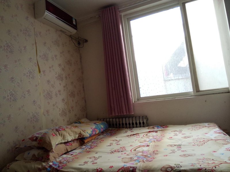 Yantai Zhen'ai InnGuest Room