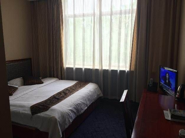 Xinhaifeng Business Hotel Guest Room