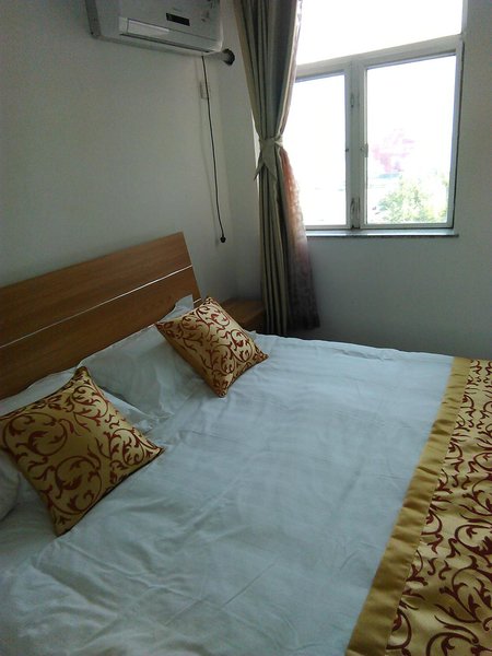 Qingdao Yiju Rujia Sea View Holiday ApartmentGuest Room