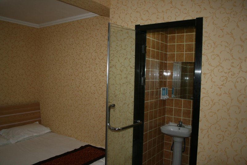 Qingdao Kang Xinmei Express Hotel Guest Room