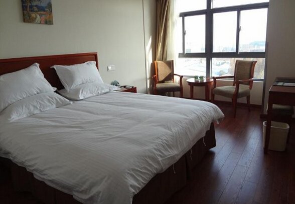 The League of nations Business Hotel Guest Room