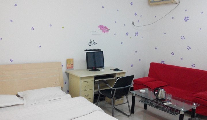 Shenglong Aiqing Apartment HotelGuest Room