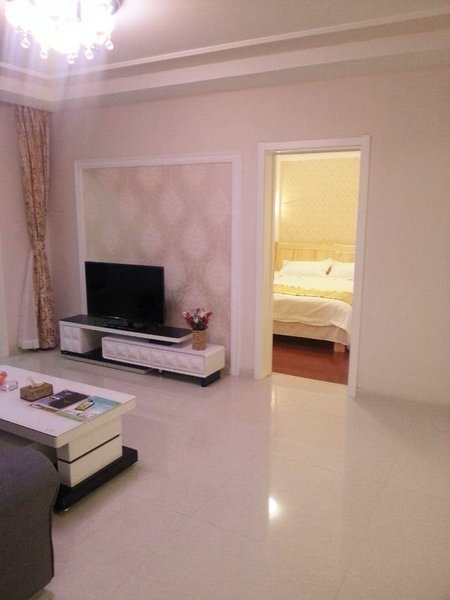 Lvyou Yijia Theme Apartment Laizhou Huangjin Hai'anGuest Room