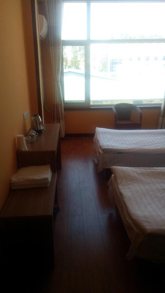 Ji Yang Jia Yi Business HotelGuest Room