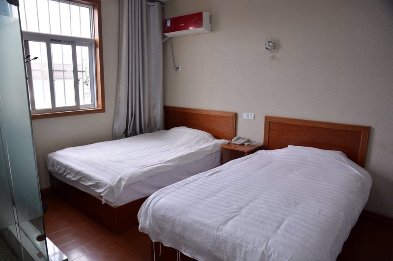 Suqian Nongjia Hotel Guest Room