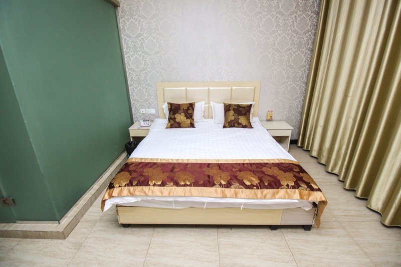 Xindu Business Hotel 客房