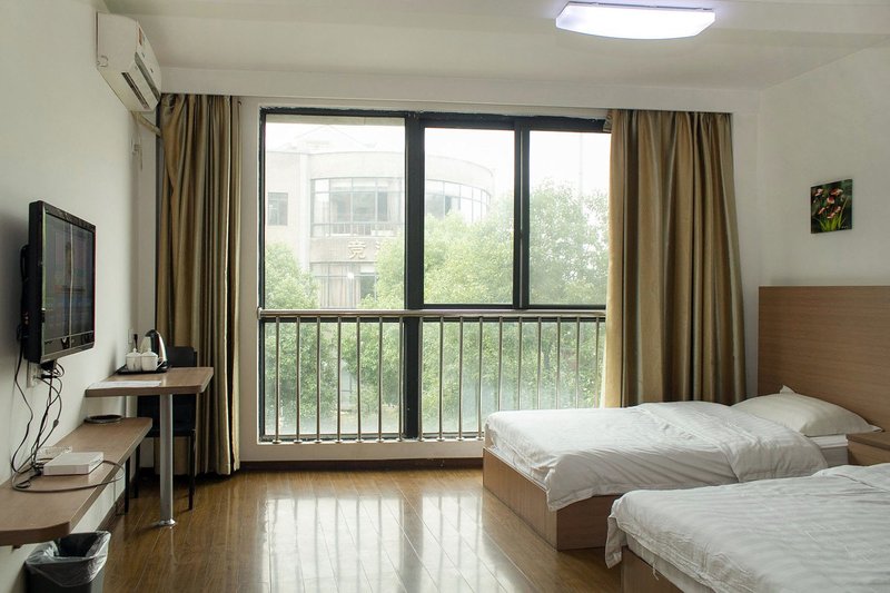 Xiqi Fenghua Express Hotel 客房