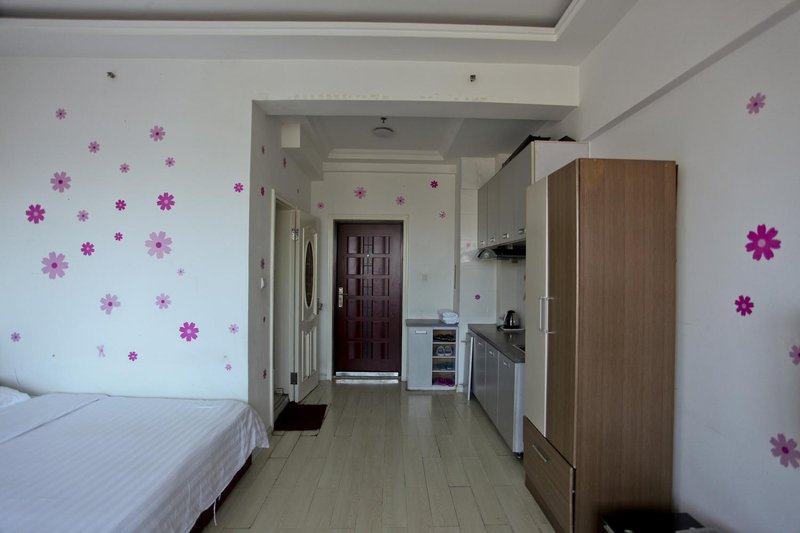 Dalian Xinghaijiaxin Apartment Guest Room