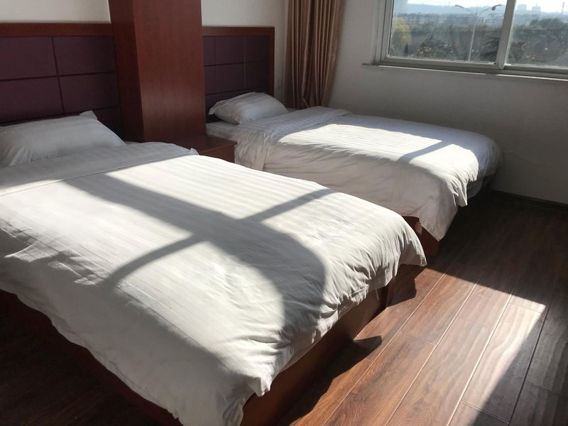 Guangming Hotel Guest Room
