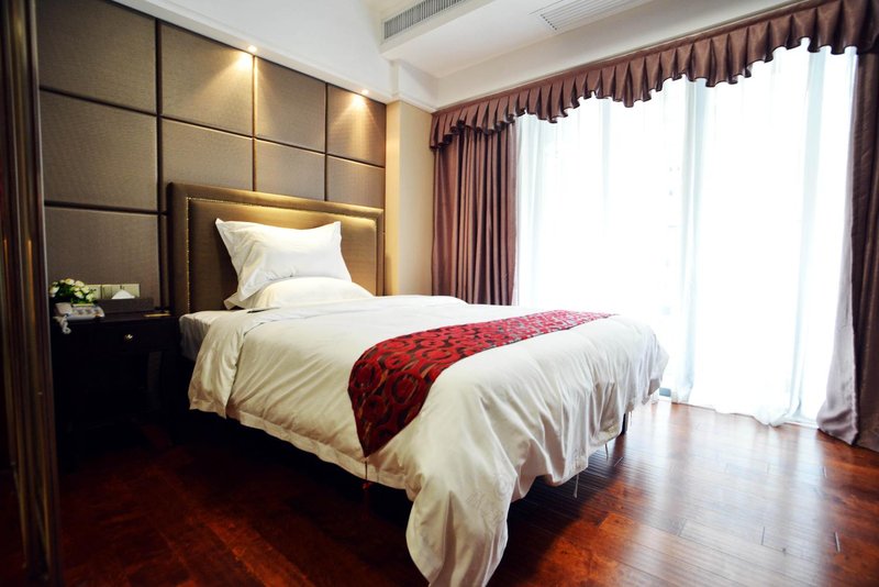 Xunyicao Apartment Hotel (Foshan Zumiao Metro Station Boduncheng) Guest Room