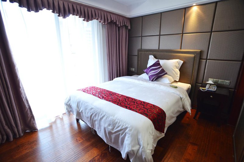 Xunyicao Apartment Hotel (Foshan Zumiao Metro Station Boduncheng) Guest Room