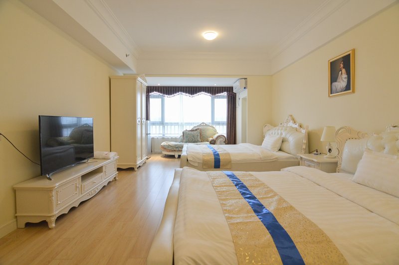 Sihai Jiuzhou Holiday Apartment (Qingdao Wanda Oriental Movie Metropolis)Guest Room