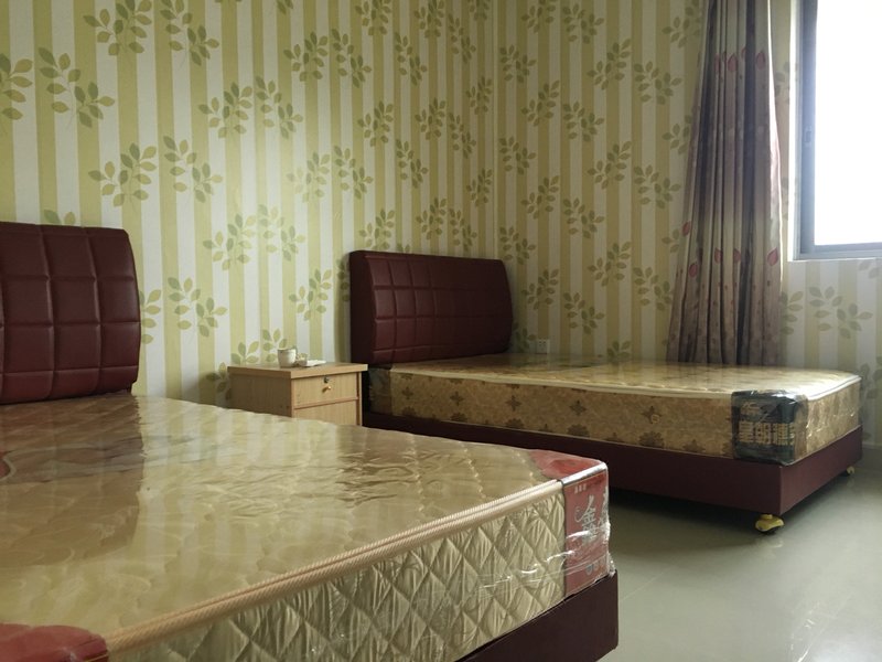 Qing'aowan Chengshi AccommodationGuest Room