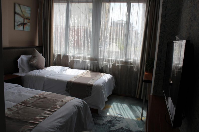 Qian Yuan Hotel Guest Room