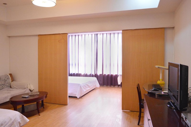 Aiqinhai No. 3 ApartmentGuest Room