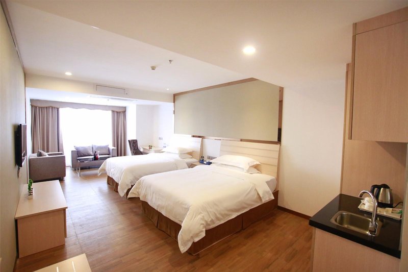 Guangzhou south railway station xin hotel apartment rock station storeGuest Room