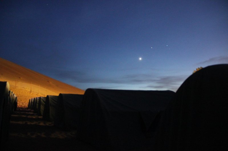 Dunhuang mountain walkers international desert camping baseOver view