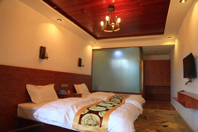 Zhaxi Yuanshengtai Romance Inn Guest Room