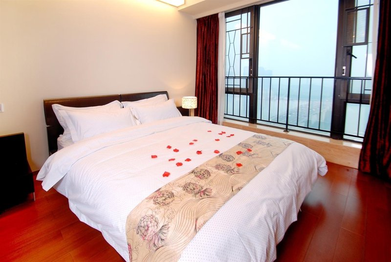 Guangzhou jinsong kayoon linjiang top grade apartment hotelGuest Room