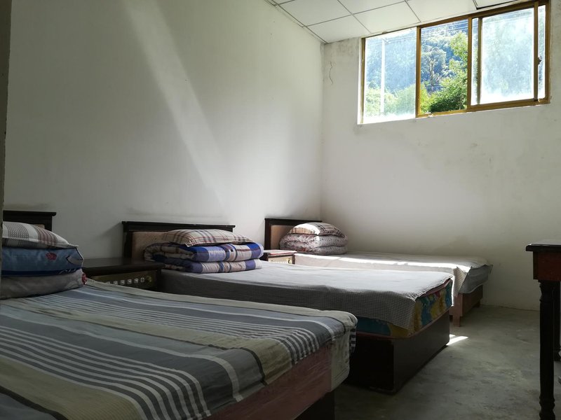 longzixianzfarixingruixuelvyoufuwujiedaizhongxinGuest Room