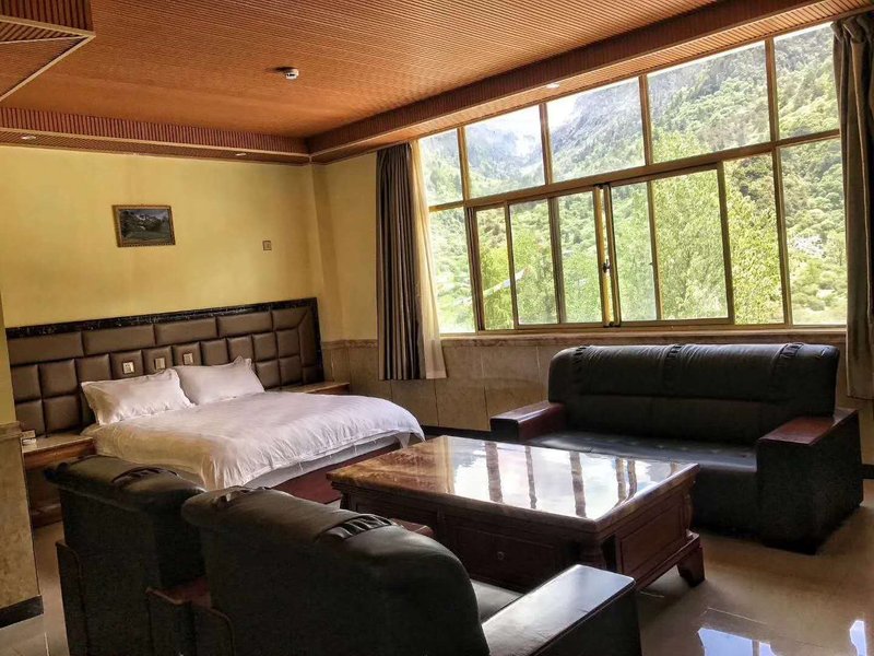 longzixianzfarixingruixuelvyoufuwujiedaizhongxinGuest Room