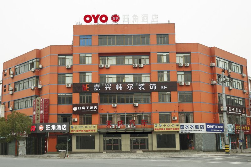 Haining Mong Kok Hotel(Chang`anEast Subway Station Entrance B)Over view