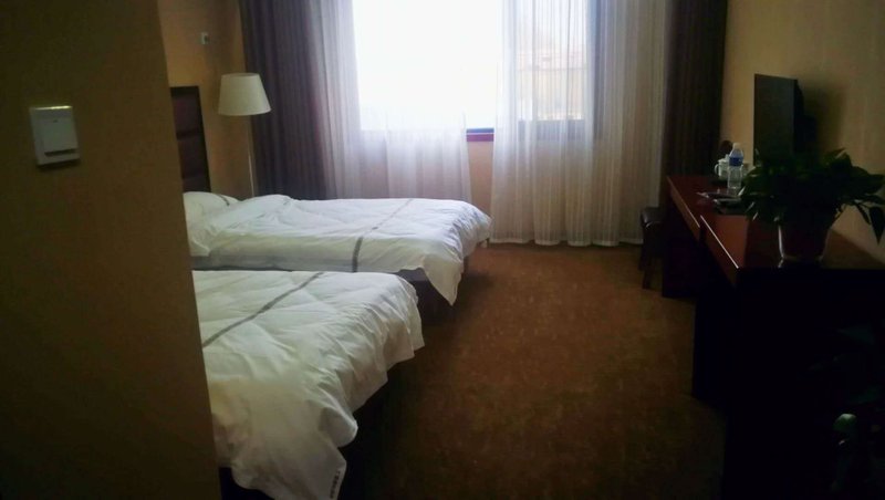 Huitong Shengshi Business Hote Guest Room