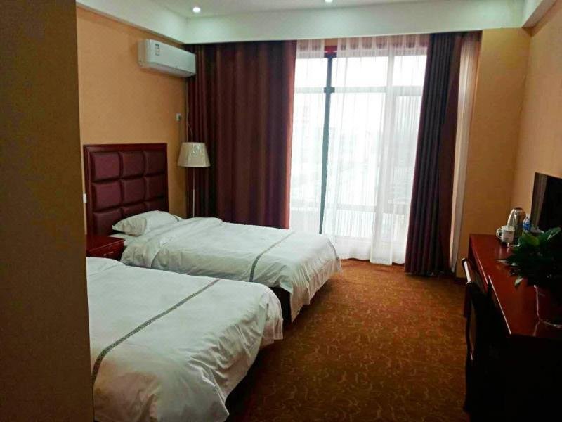 Huitong Shengshi Business Hote Guest Room