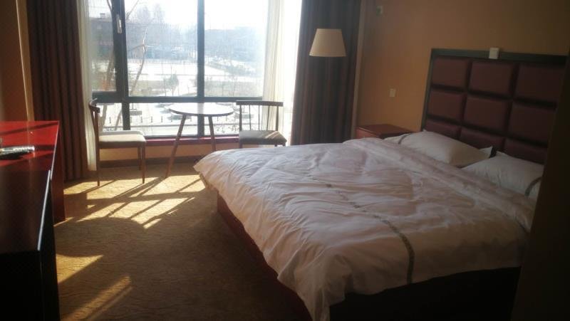 Huitong Shengshi Business Hote Guest Room