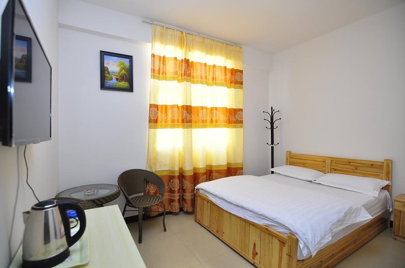Wuhua Sunshine Hostel Guest Room