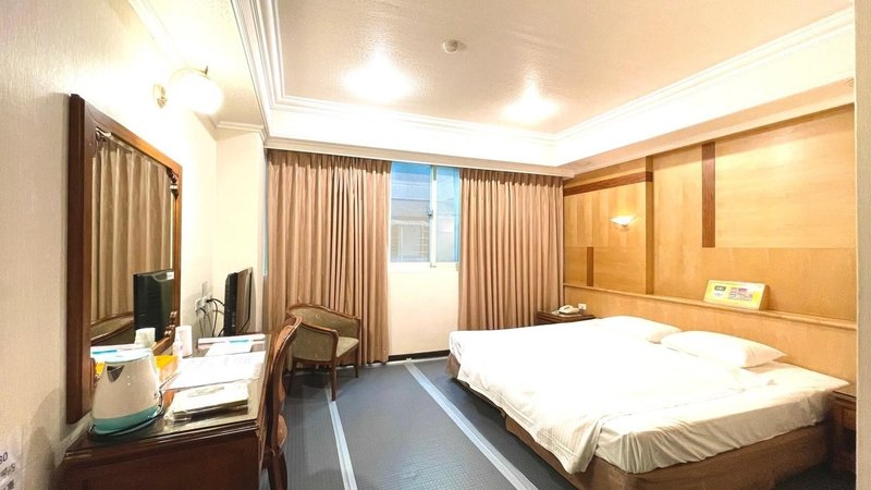 Champion Hotel Guest Room