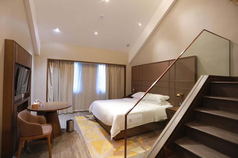 Flora Hotel ZhifuGuest Room