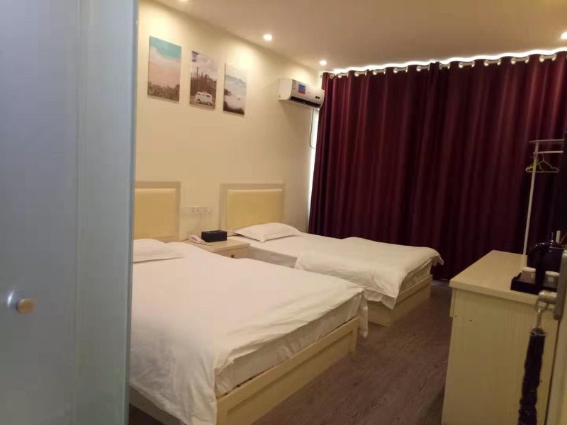 JiKaiLong Hotei ApartmentGuest Room