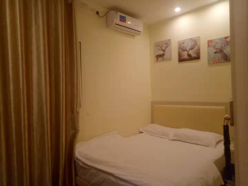 JiKaiLong Hotei ApartmentGuest Room